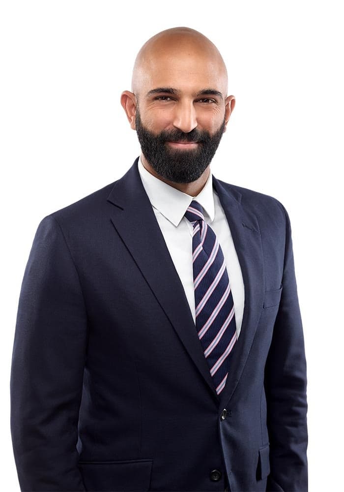 Javid Dharas Bio Headshot